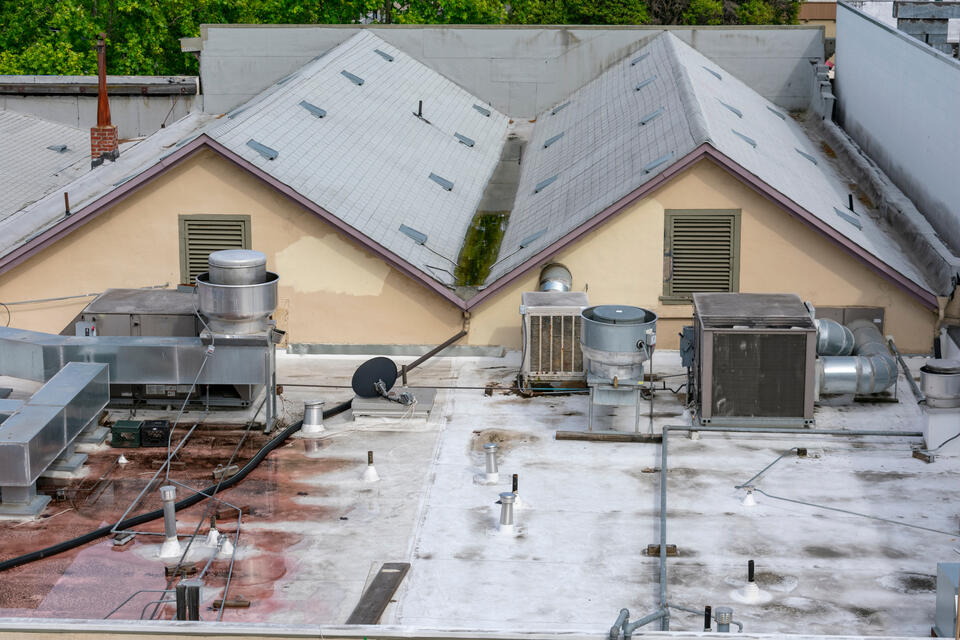 commercial roof leak repair-overhead view of a commercial roof with a leak